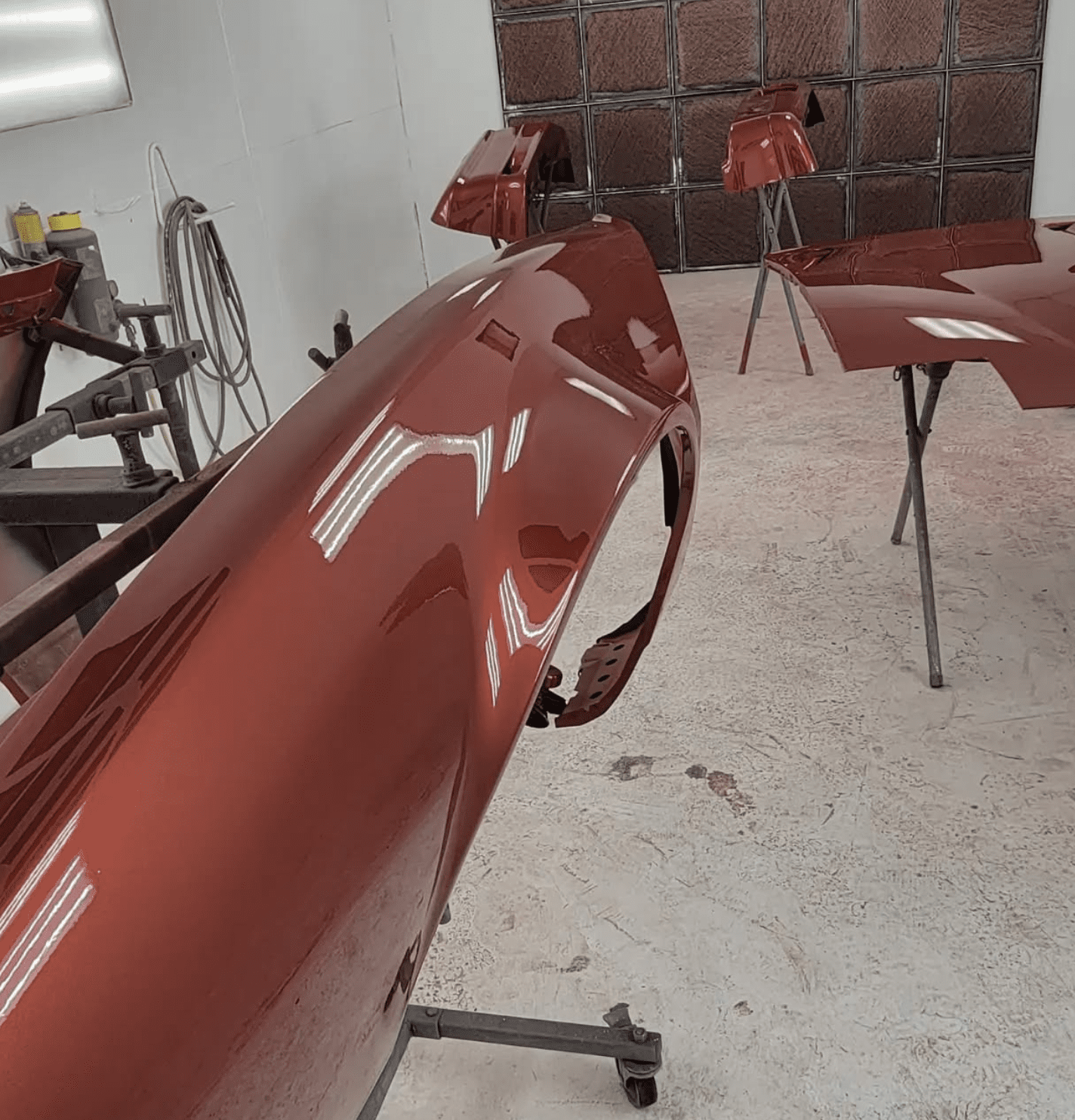 Car part painted shiny red